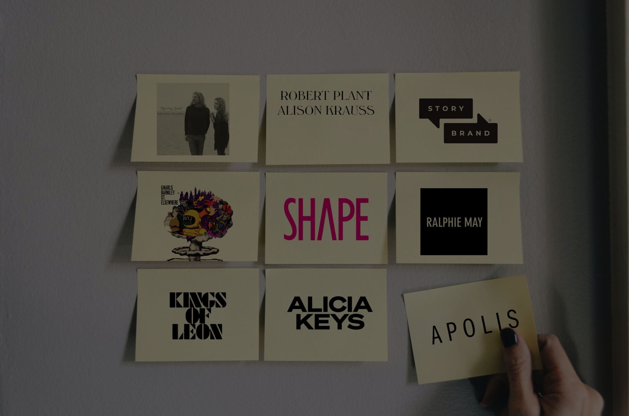 Wall of sticky notes featuring logos of StoryBrand, Alicia Keys, Kings of Leon, Apolis, and other Waterloo Digital clients